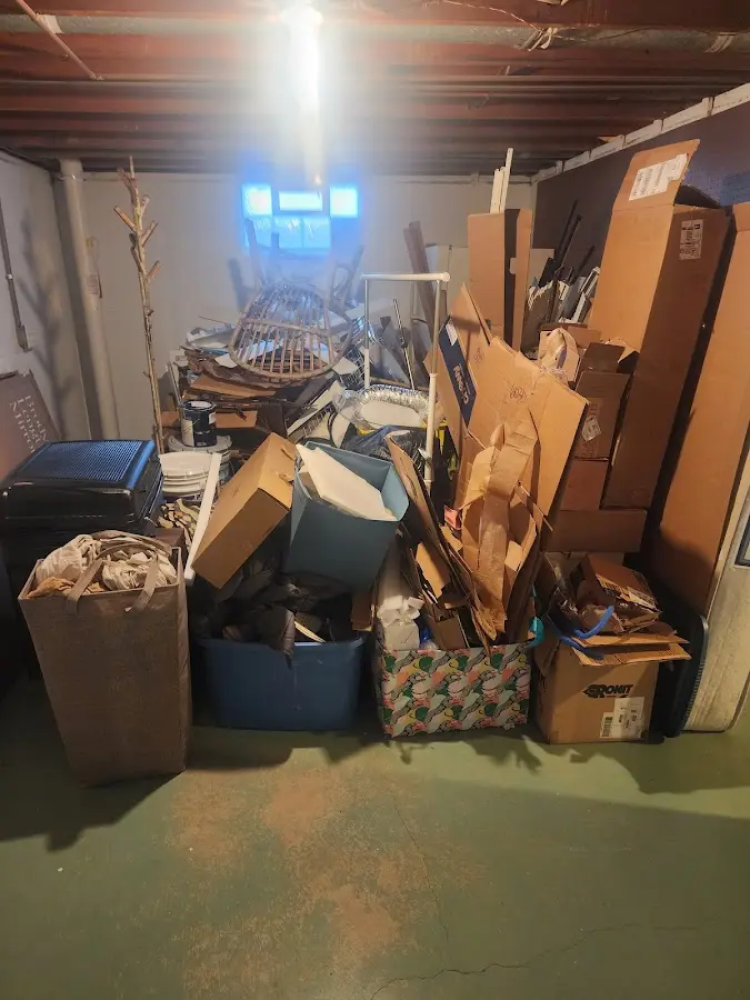 Roll-off dumpster container at job site for 4 Yard Dumpster Rental in Coweta